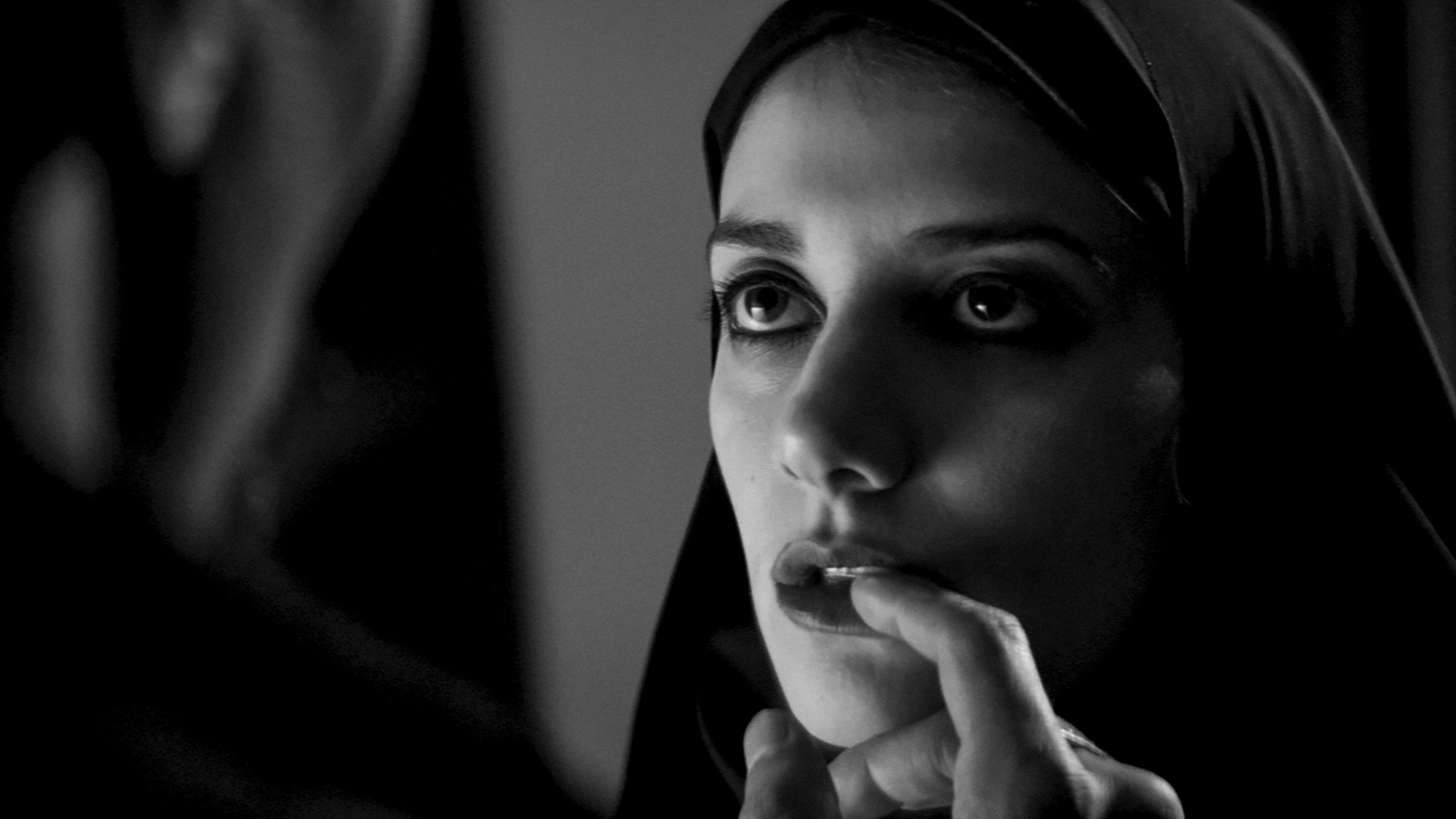 A Girl Walks Home Alone at Night scene photo