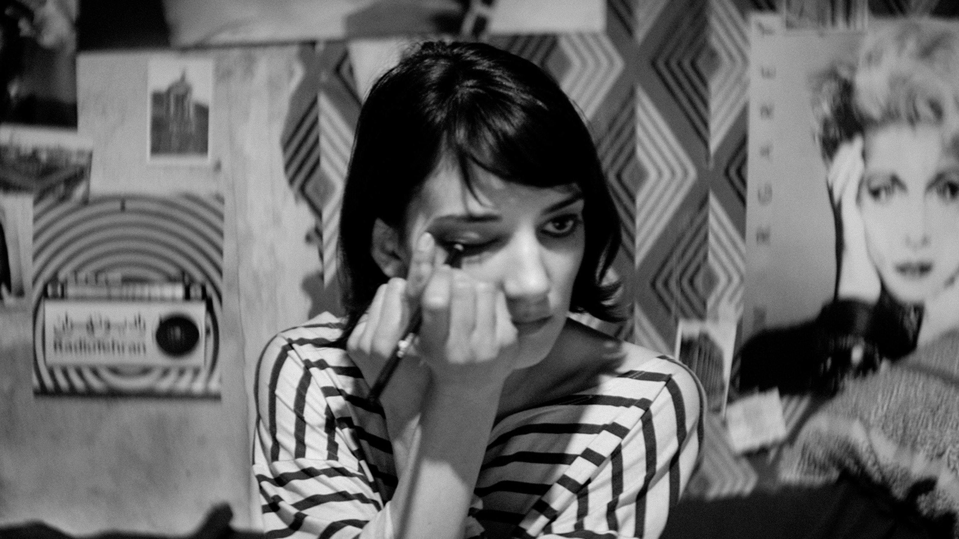 A Girl Walks Home Alone at Night scene photo