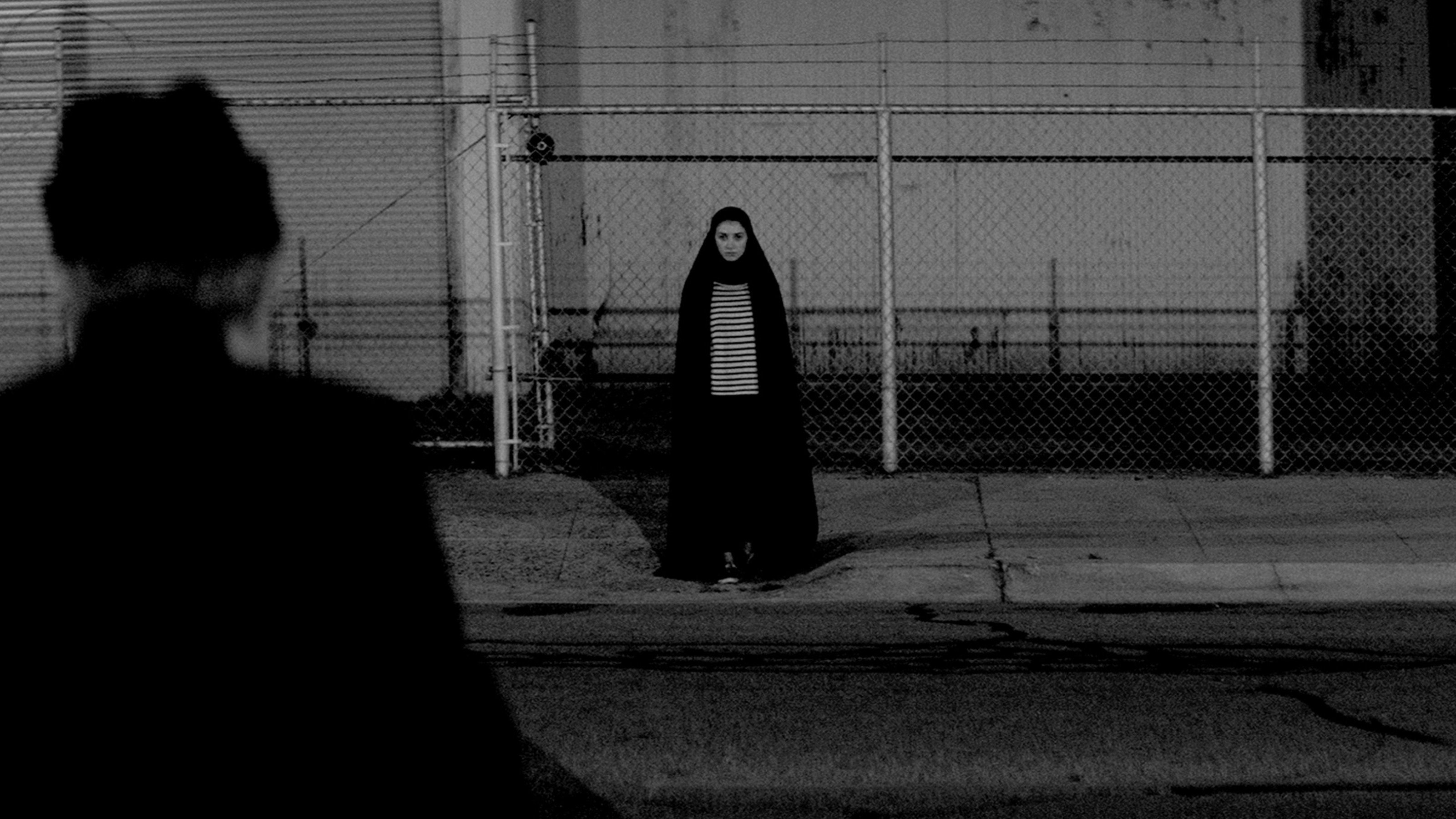 A Girl Walks Home Alone at Night scene photo
