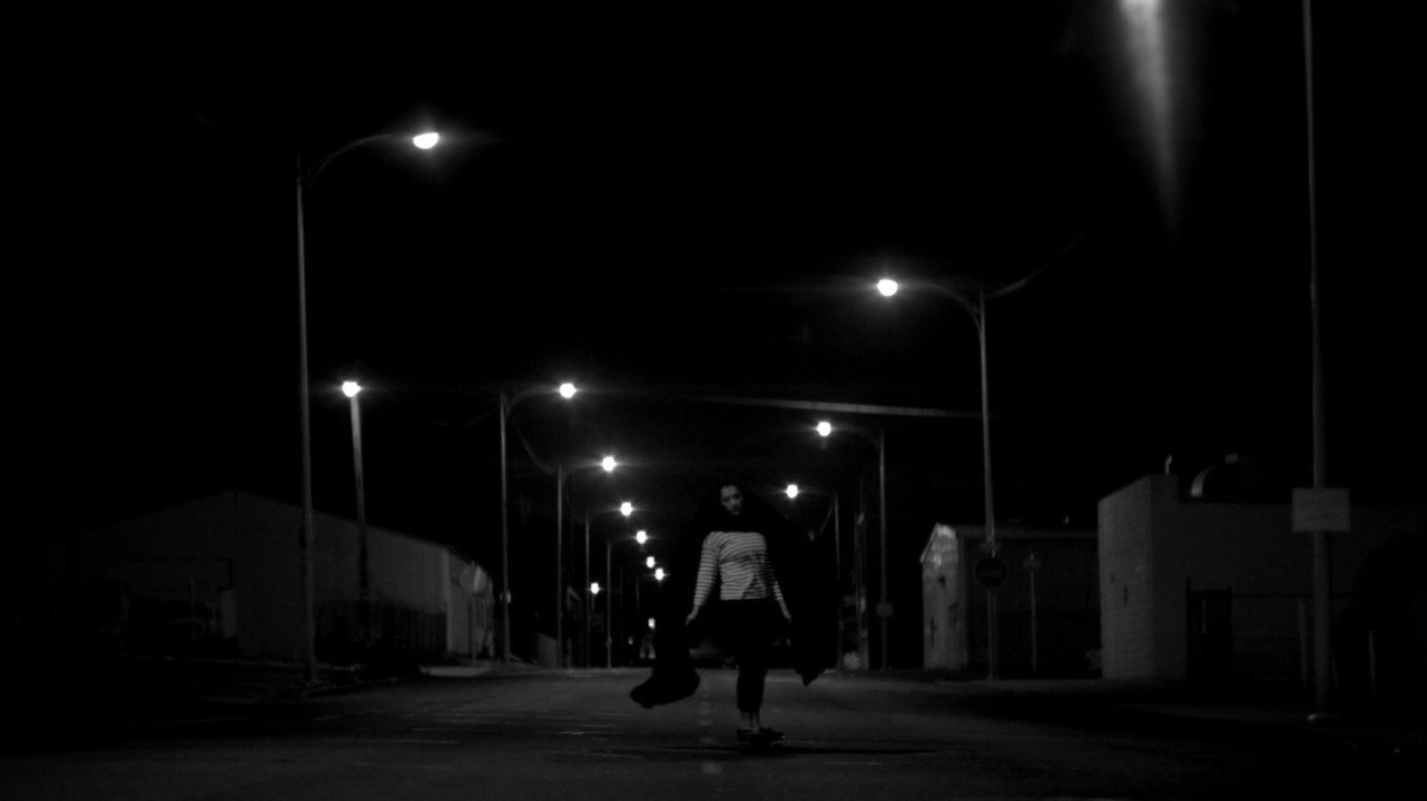 A Girl Walks Home Alone at Night scene photo