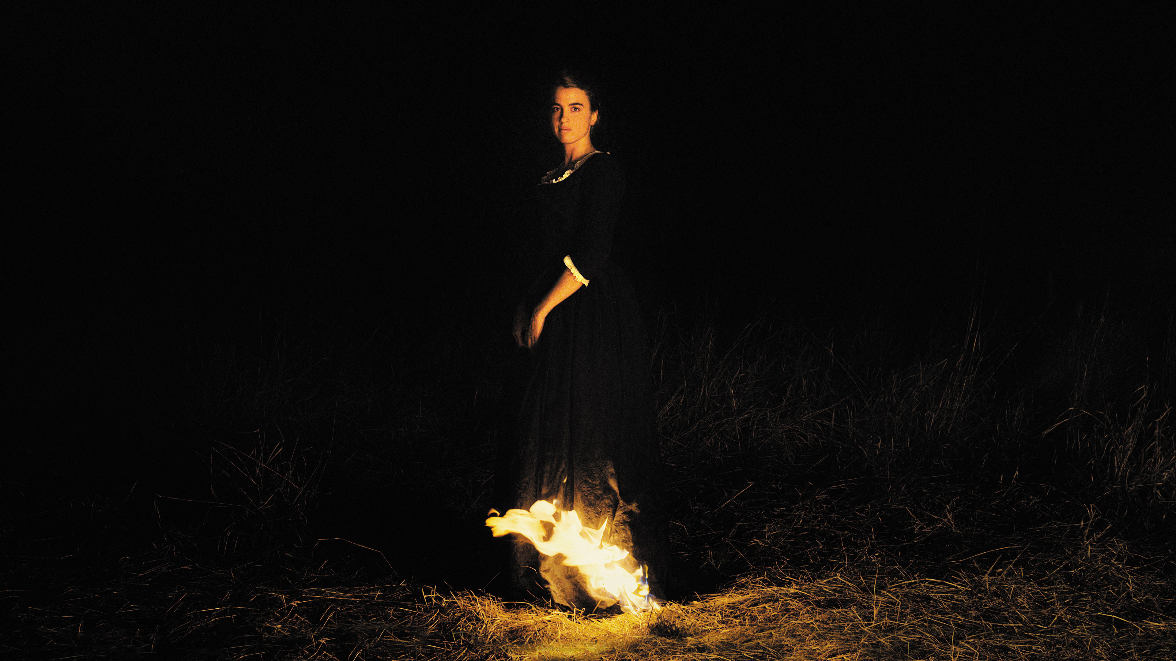 Portrait de la jeune fille en feu scene photo