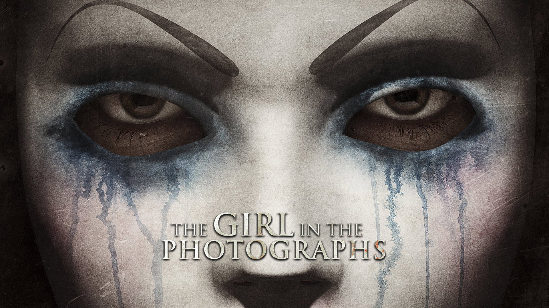 The Girl in the Photographs scene photo